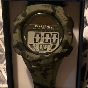 Solar digital watch